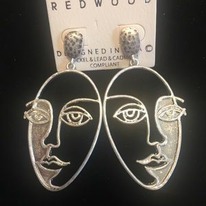 Silver tone lady face earrings